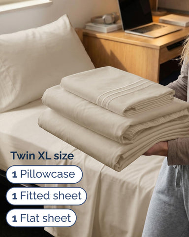 CGK Unlimited flat sheet fully spread on bed showing coverage and smooth drape