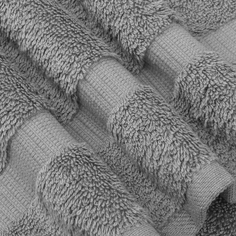 Chakir Turkish Linens towel absorbing water droplets showing fast absorbency benefit