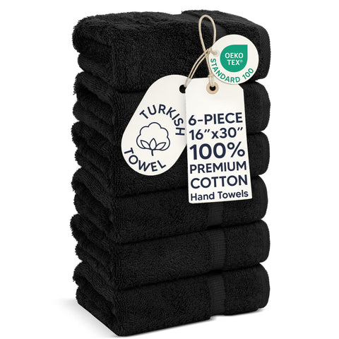 Chakir Turkish Linens front view showing six black hand towels and neat packaging for gifting