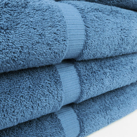 Chakir Turkish Linens towel draped in bathroom lifestyle scene for spa-like comfort benefit