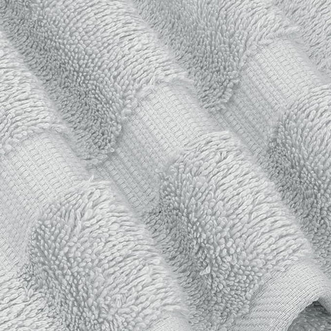 Chakir Turkish Linens towel next to ruler showing 30x60 size for generous coverage
