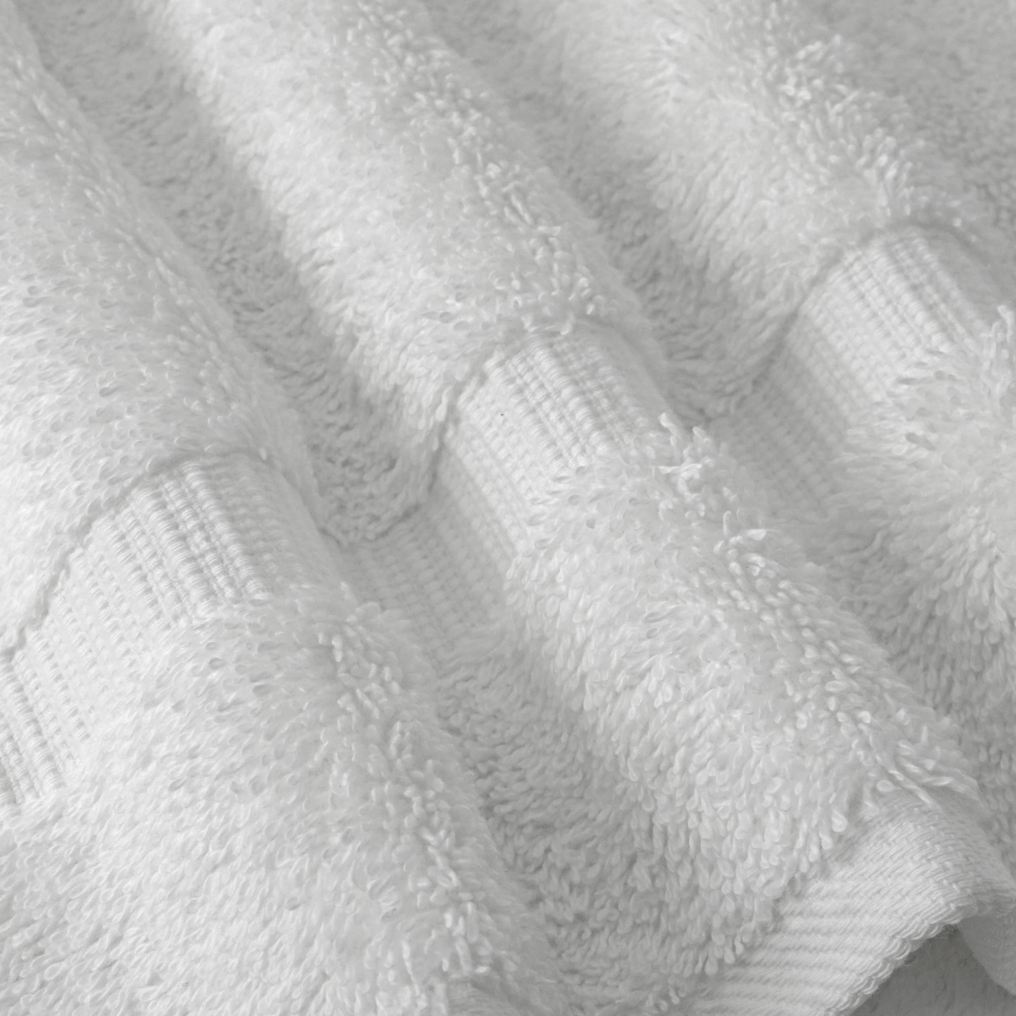 Chakir Turkish Linens towel beside ruler showing 30x60 size for better wrap-around benefit