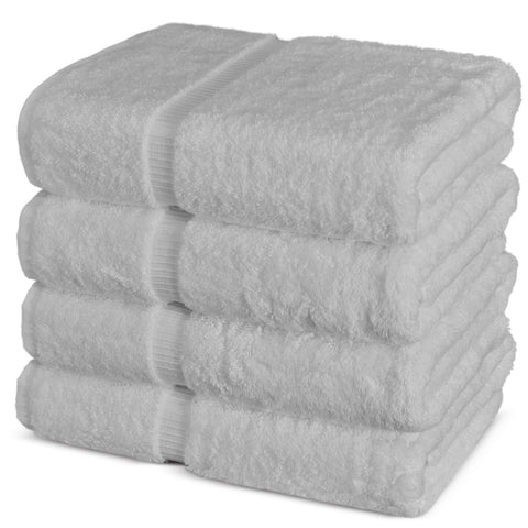 Chakir Turkish Linens towel beside toilet to show 27x54 inch size scale