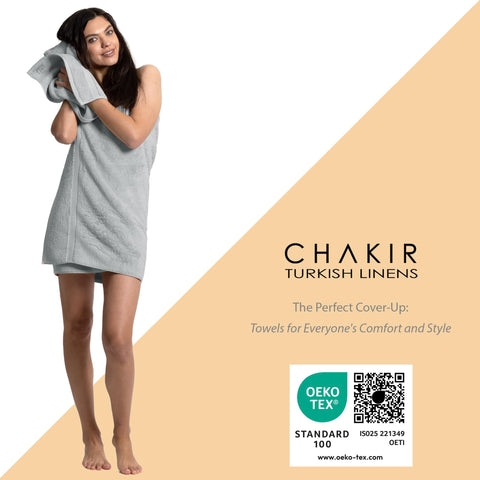 Chakir Turkish Linens towel being used to dry hair, demonstrating full coverage benefit