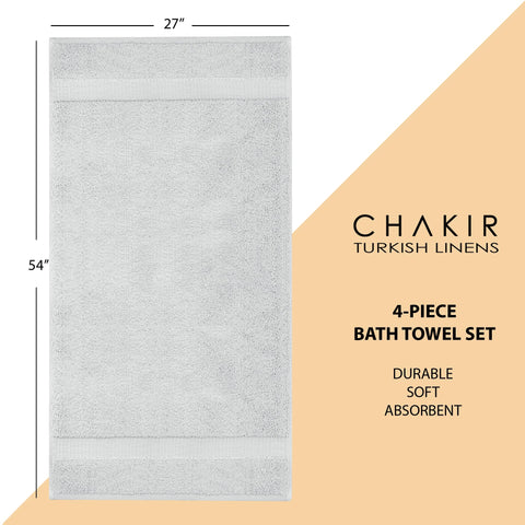 Chakir Turkish Linens towel laid on bathmat to show 27 x 54 inch size and full coverage