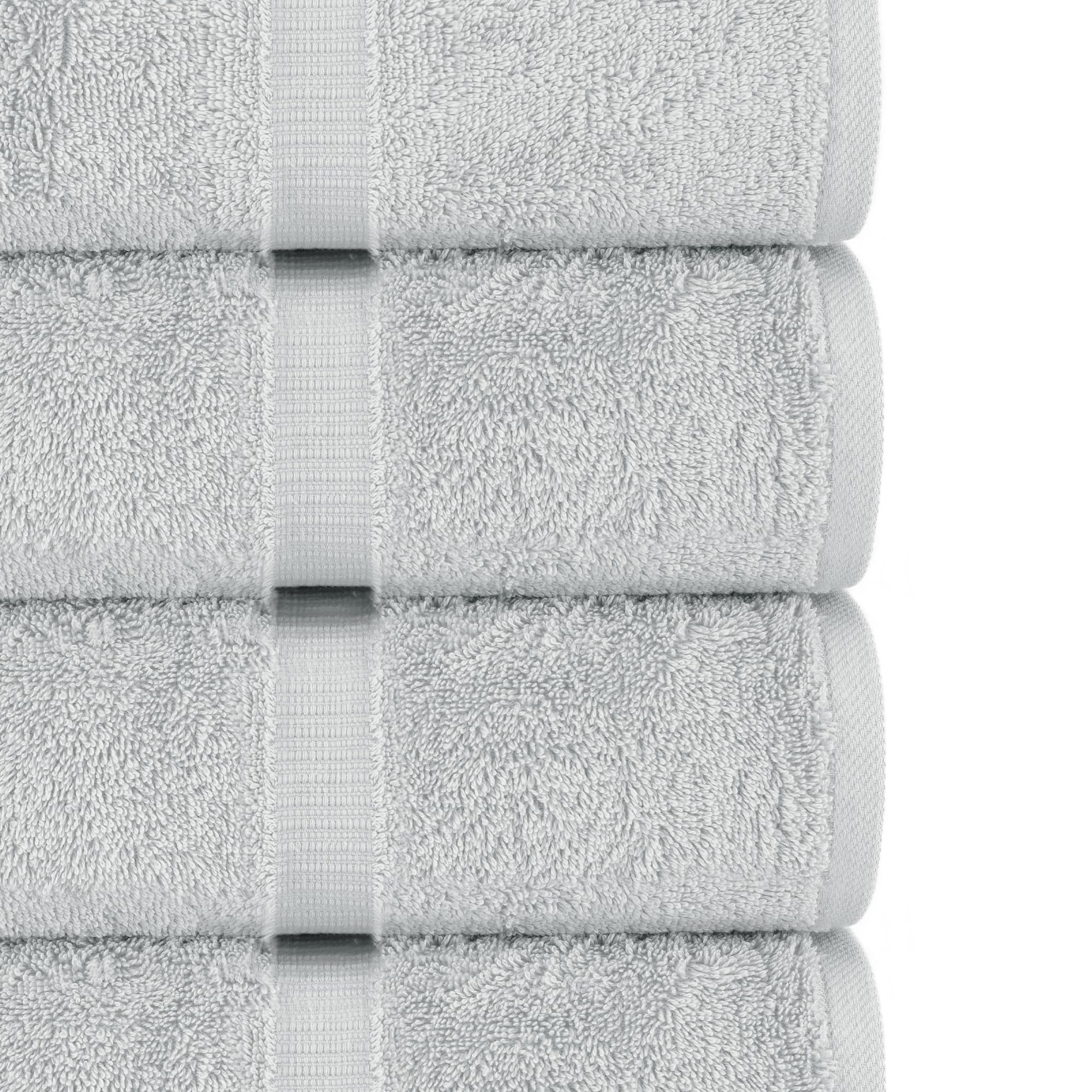 Chakir Turkish Linens towel being used to dry hands demonstrating quick water pickup