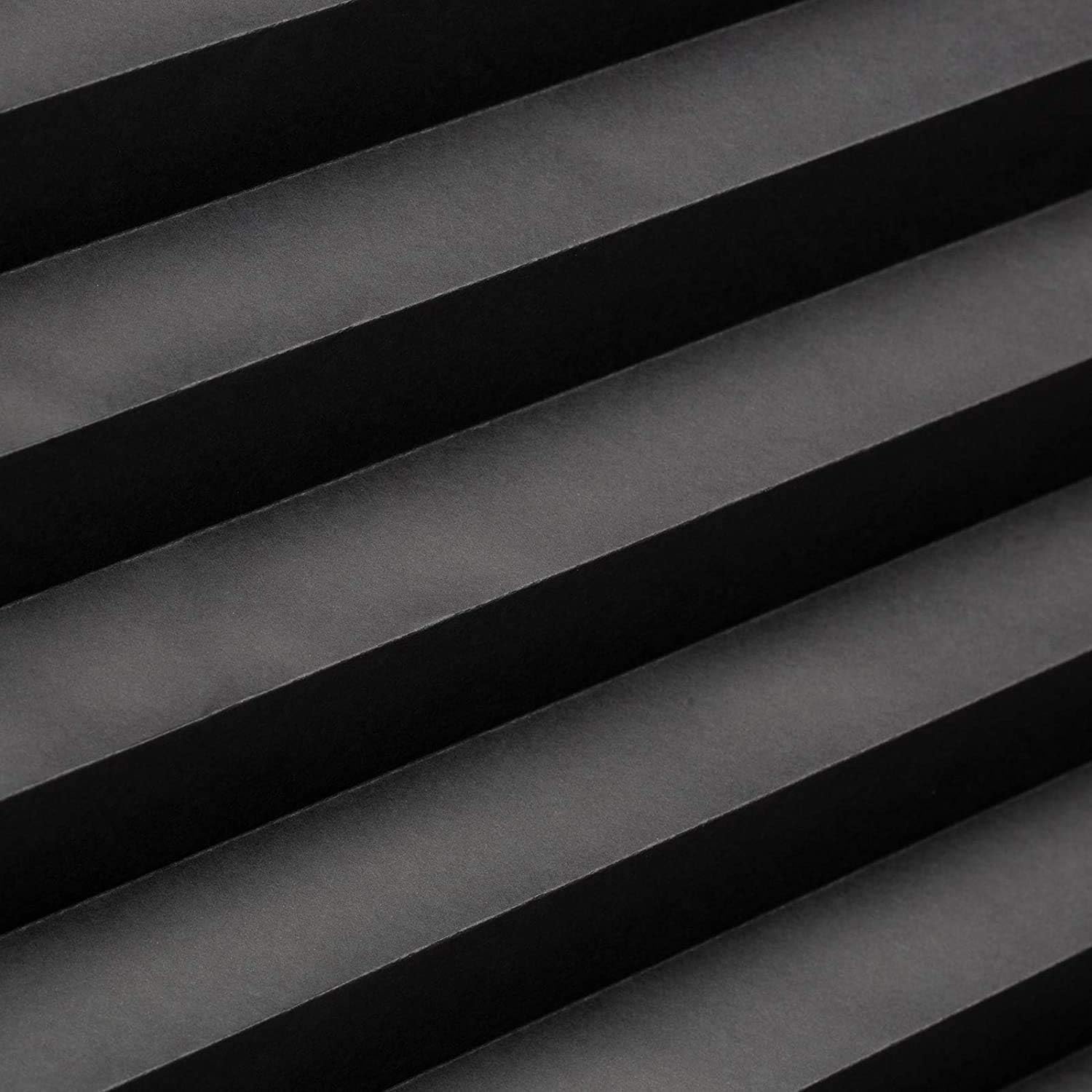 Changshade black and white panels side by side showing light control options