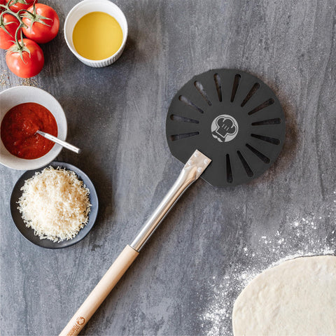 Chef Pomodoro next to a pizza to show scale and precise maneuvering benefit