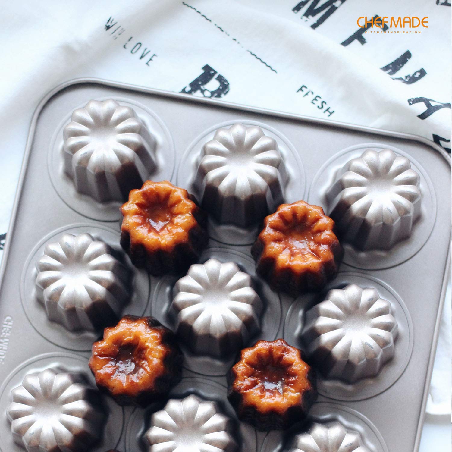 CHEFMADE pan with freshly baked canelés top-down, showcases even browning and consistent results