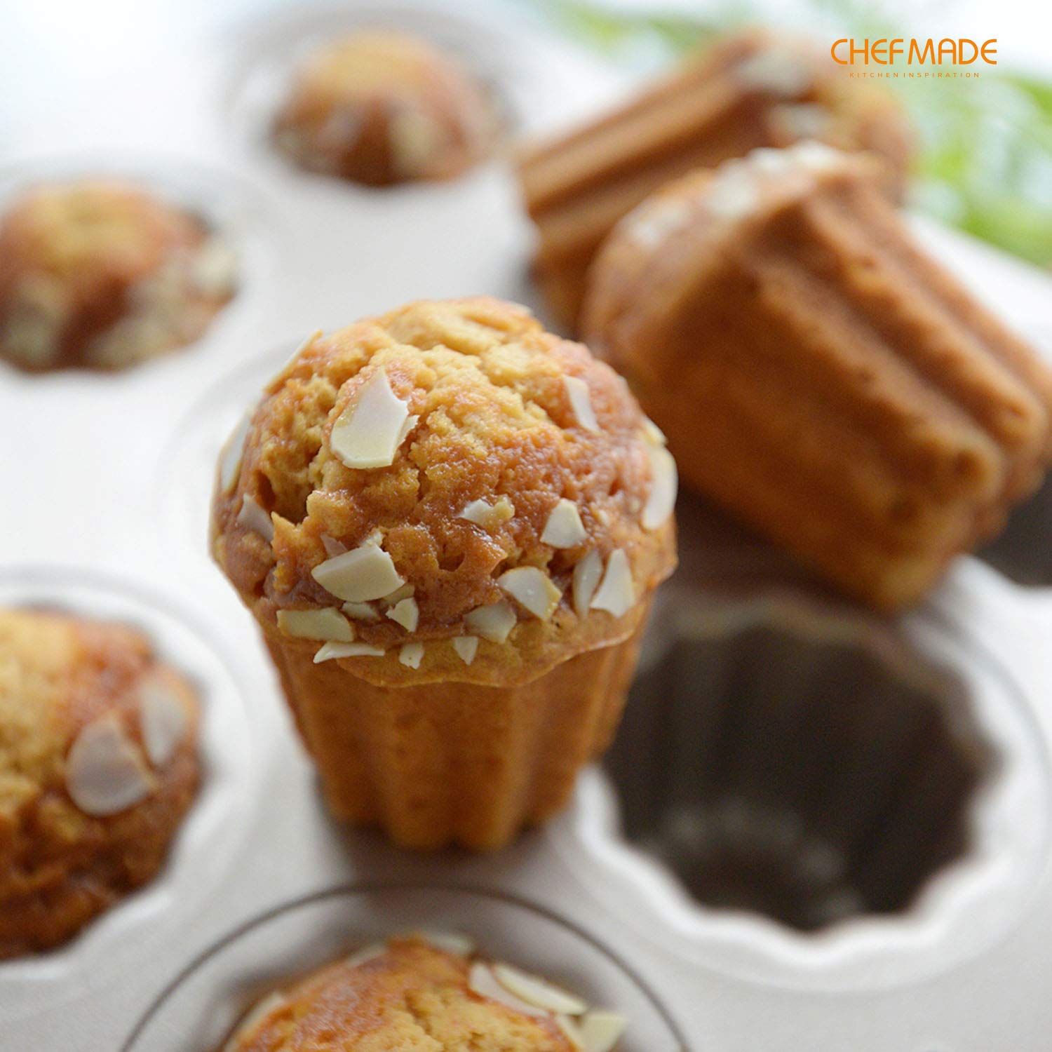 CHEFMADE canelé pan in a tea setting with plated desserts, ideal for entertaining and presentation