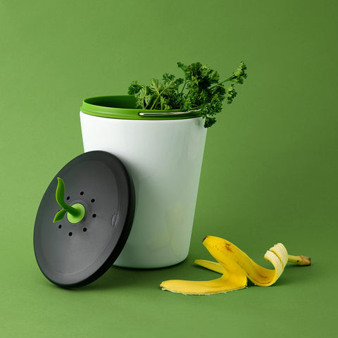 Chef'n EcoCrock near hand for scale showing 3.3‑liter capacity and space‑saving advantage