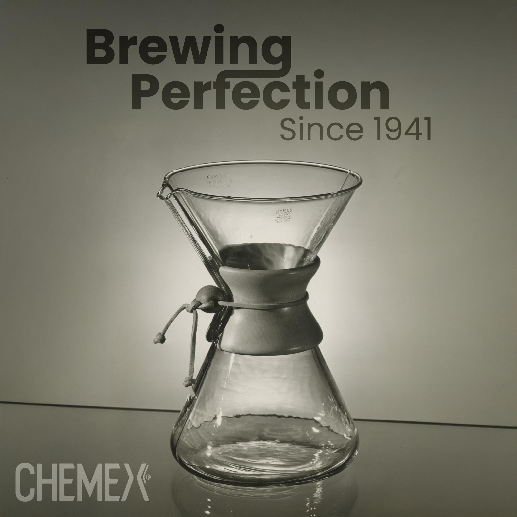 Chemex beside a hand for scale showing 6-cup capacity benefit