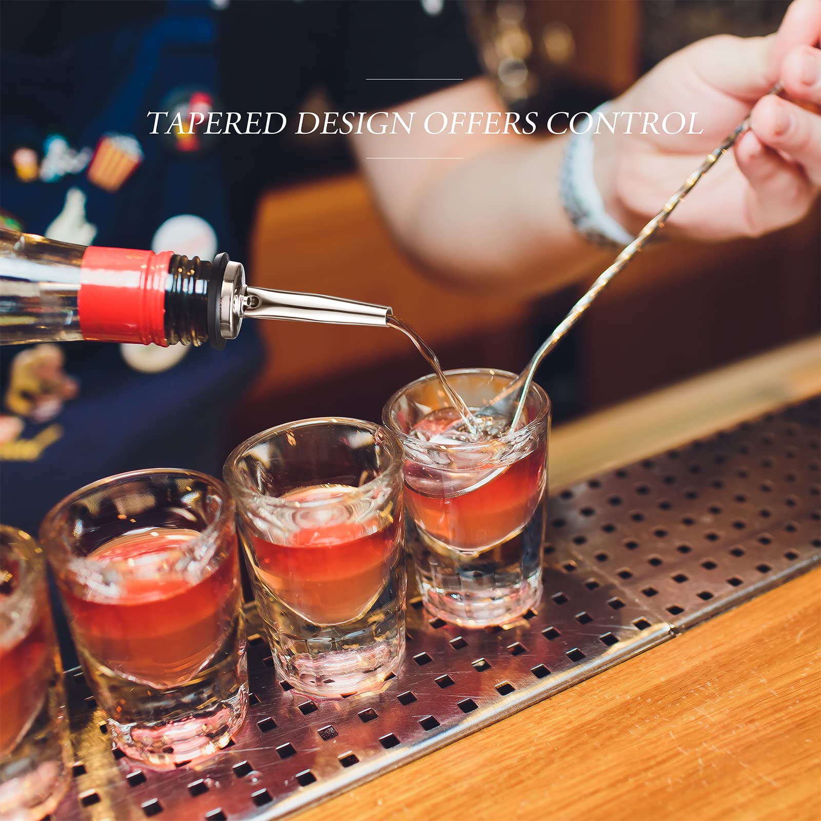 CHENGU spout installed in liquor bottle illustrating tidy, drip-free pouring