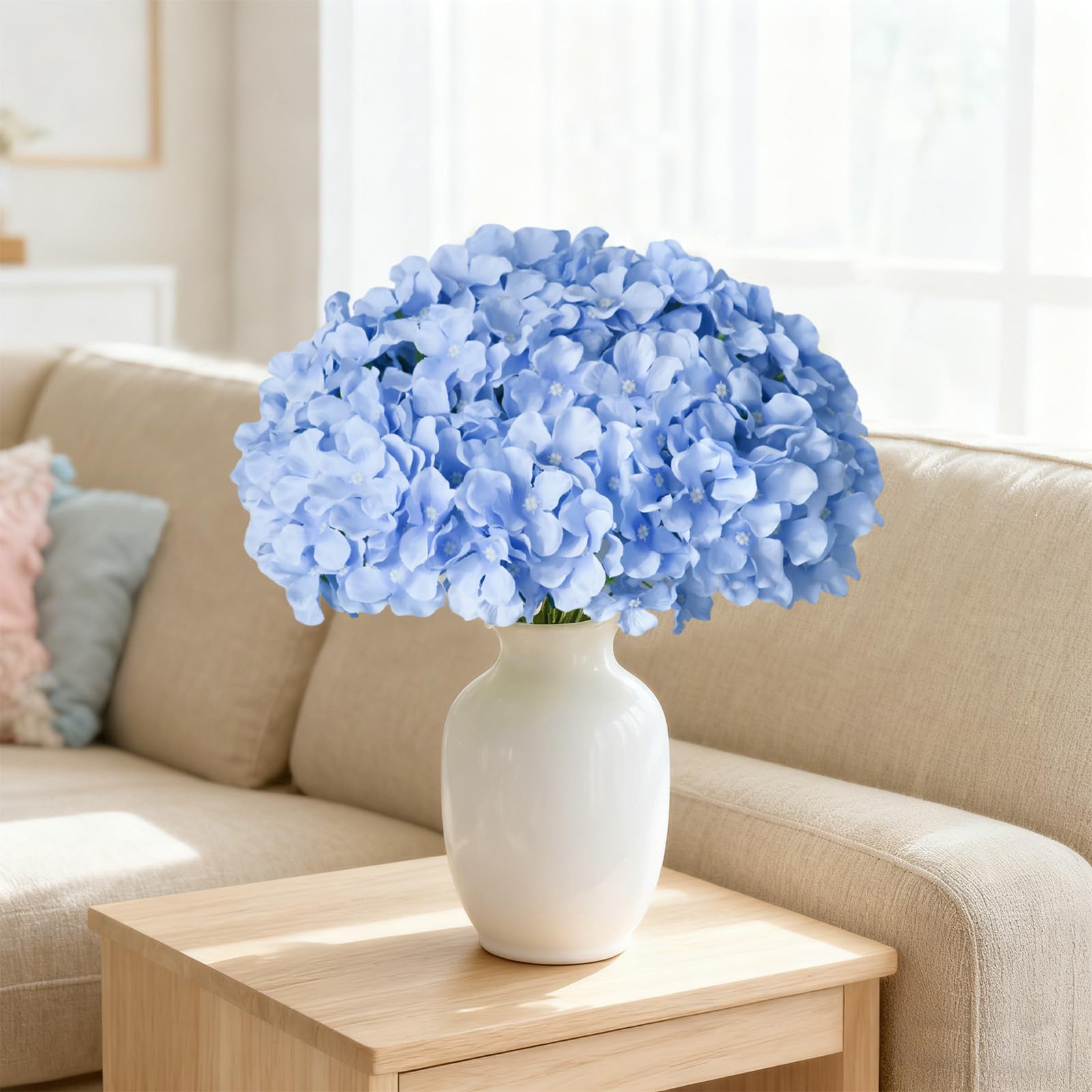 Cherica hydrangea head next to hand demonstrating large 12-inch scale