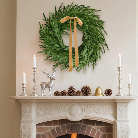 Cherica wreath on front door showing size and welcoming seasonal entrance benefit