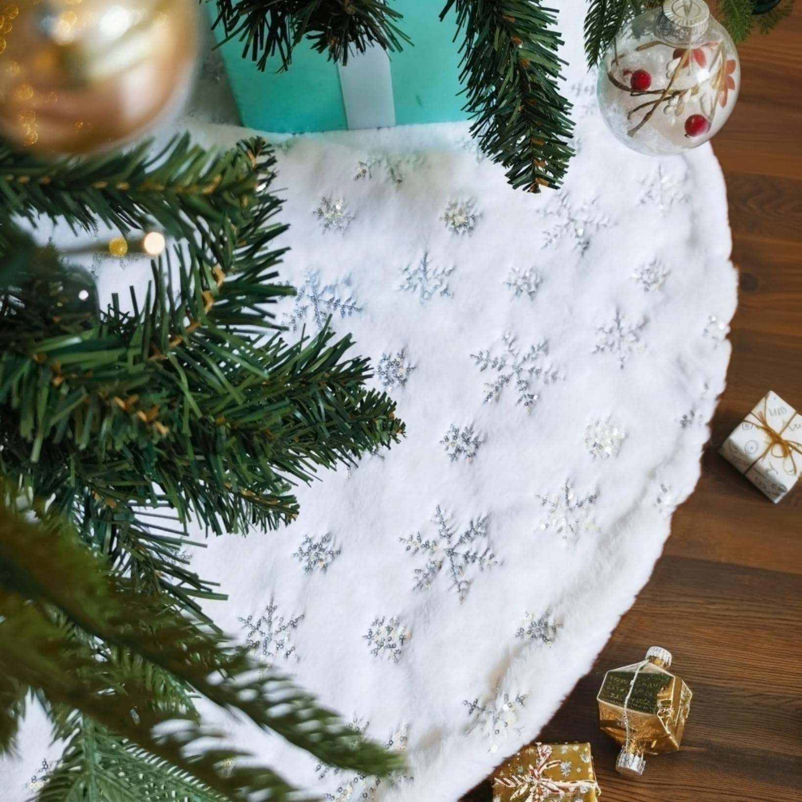 CHICHIC lifestyle scene with tree skirt in living room creating festive holiday atmosphere