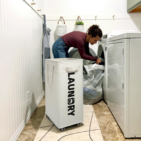 CHICVITA lifestyle shot in bedroom illustrating convenient daily laundry transport