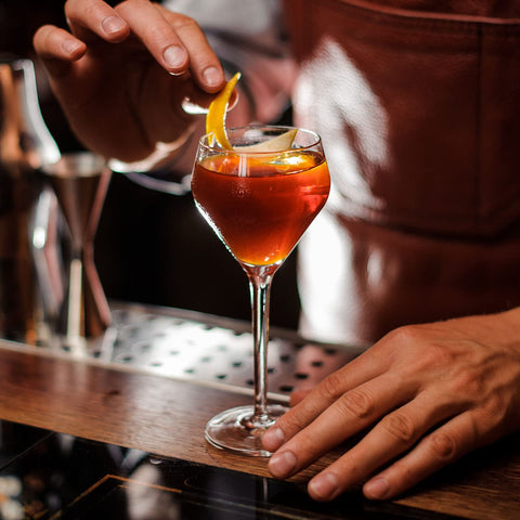 Chouggo glass filled with martini on bar showing presentation and aroma focus