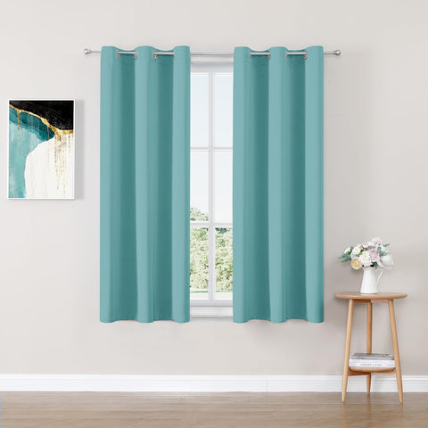 ChrisDowa front view of full-length blackout panels showing modern look and privacy