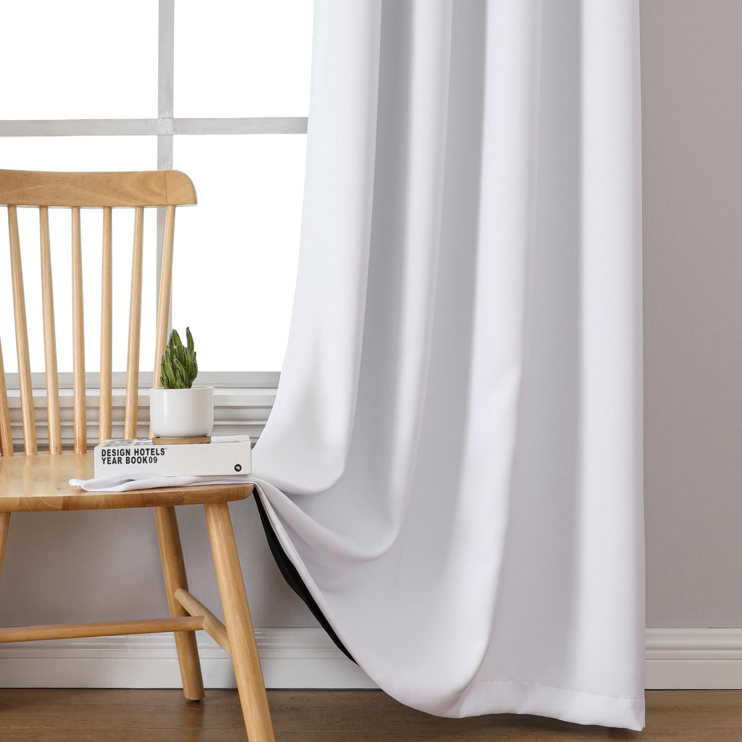 ChrisDowa curtains beside a window showing scale and correct fit