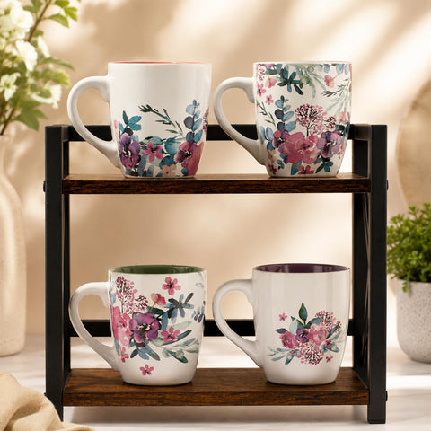Christian Art Gifts view of four mug interiors showing pink, purple, light blue, and sage tones