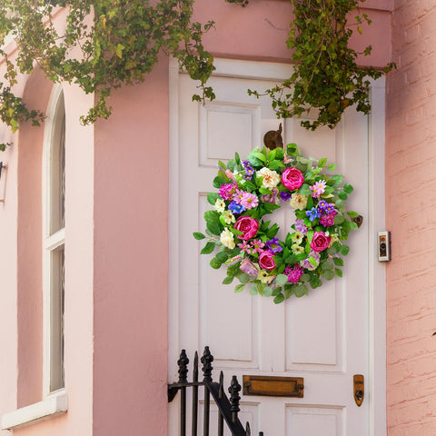 CHvista wreath hung on a front door showing welcoming entrance and seasonal charm