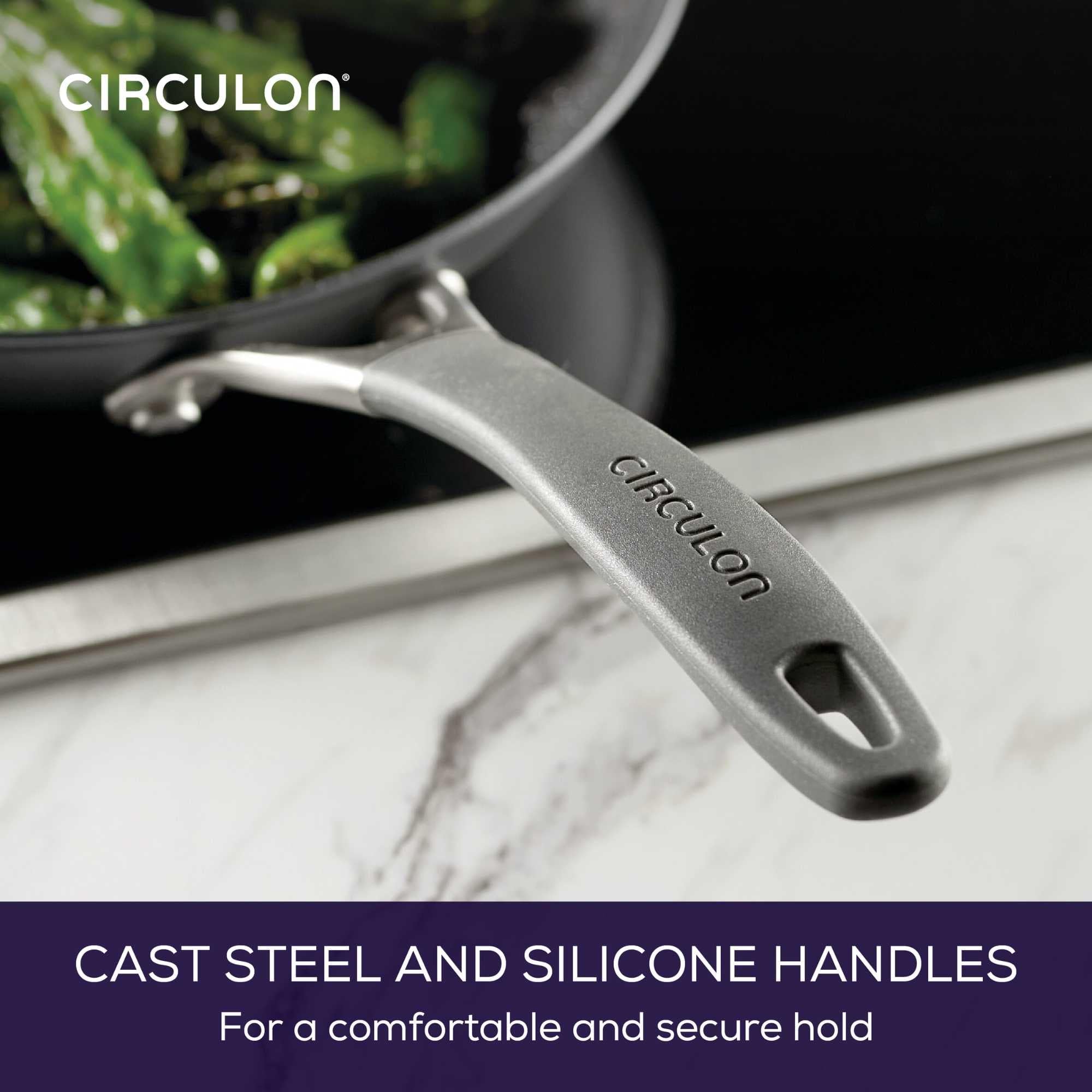 Circulon frying pan searing steak to show high-heat performance and nonstick release