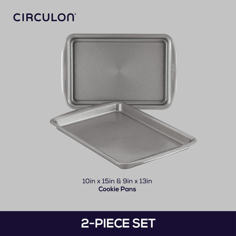 Circulon wide handle detail offering secure grip benefit while wearing mitts