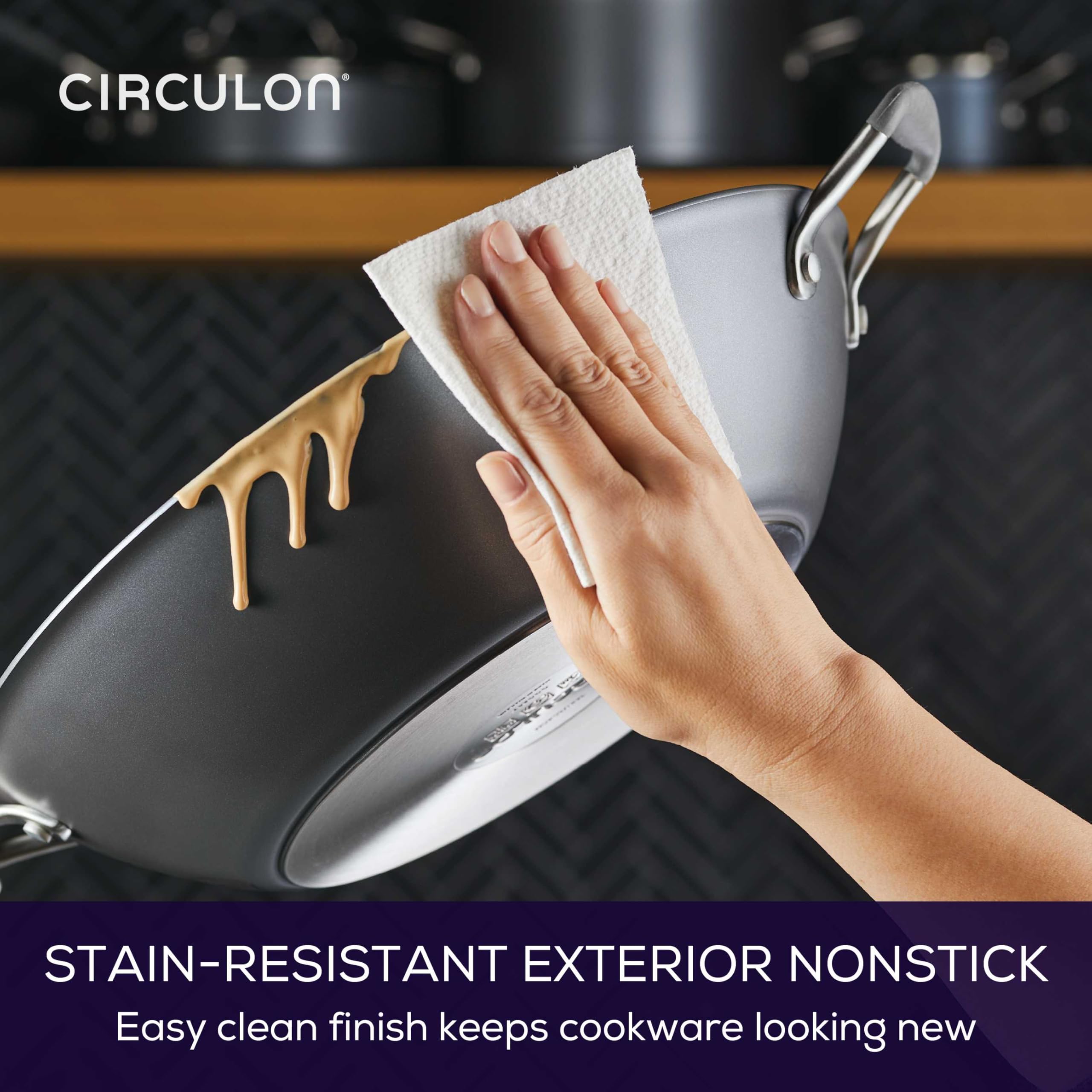 Circulon wok beside utensils to show scale, large 14-inch capacity for family meals.