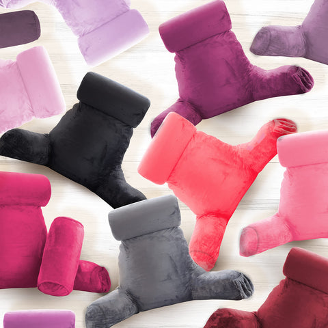 Clara Clark reading pillow on bed showing relaxed lifestyle comfort