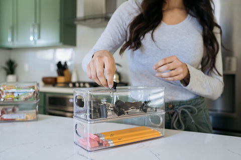 ClearSpace bins on kitchen counter organizing snacks for tidy countertops benefit
