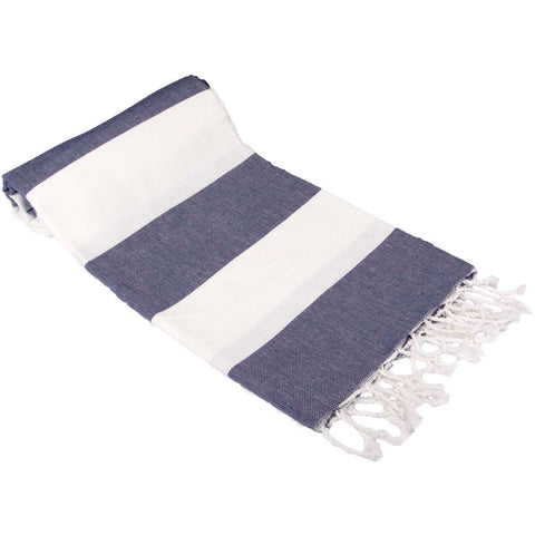 Clotho towel next to a ruler illustrating 40x70 inch scale for size clarity