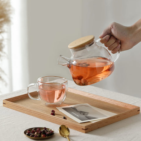 CNGLASS blooming tea inside pot highlighting visual infusion experience