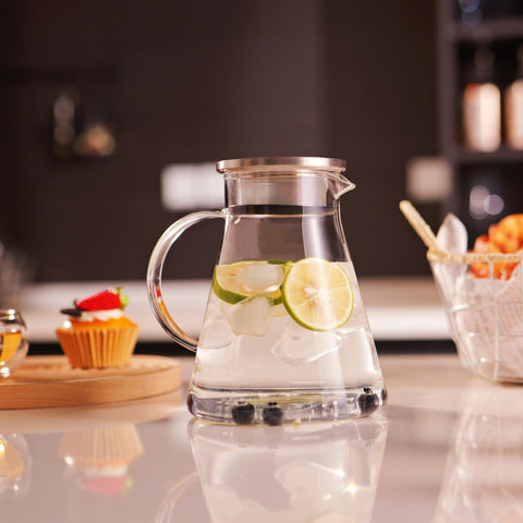 CNGLASS lifestyle image of blooming tea inside teapot showing visual infusion and brewing enjoyment