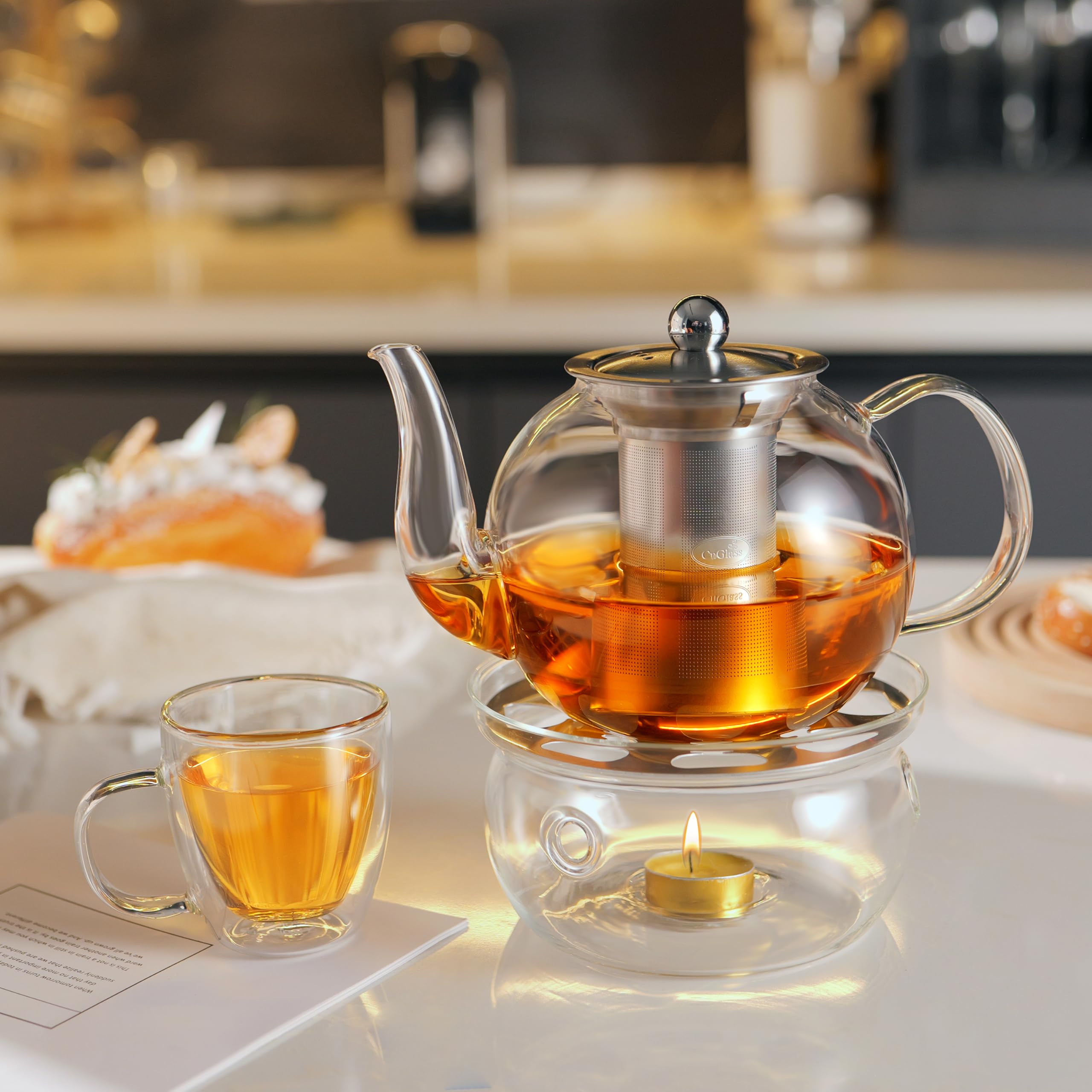 CNGLASS teapot on stovetop using medium heat showing stovetop-safe borosilicate benefit