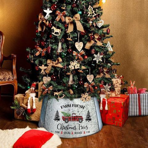 cocomong assembled around a tree in living room, creates tidy base and seasonal focal point
