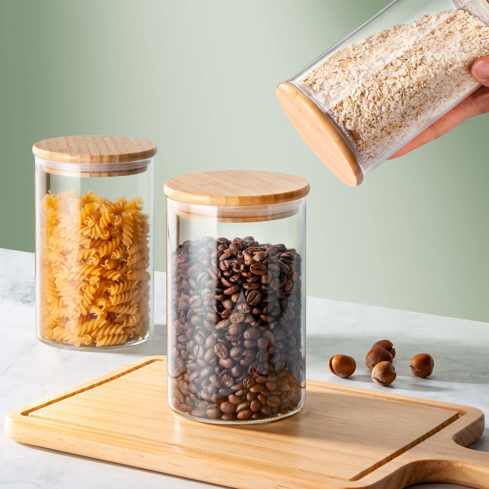 COCOYA jars styled in pantry offering tidy visible organization