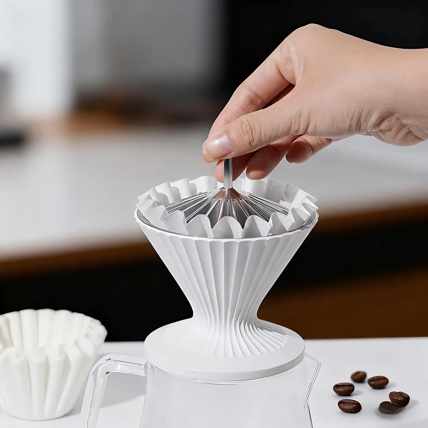codale next to a spoon for scale, codale shows compact size and easy storage