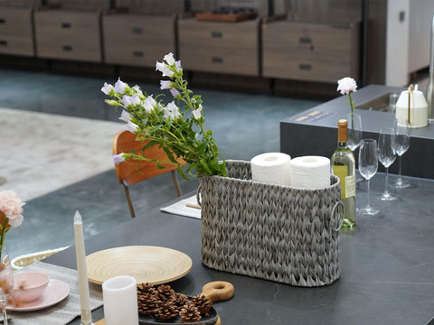 Coeusy basket filled with rolled towels showing multi-use storage versatility