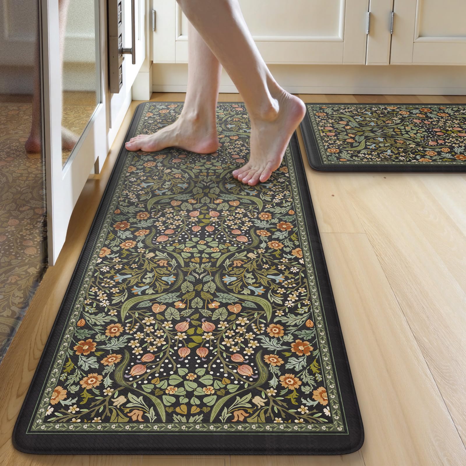 Collive front view of two kitchen mats showing floral design and comfort