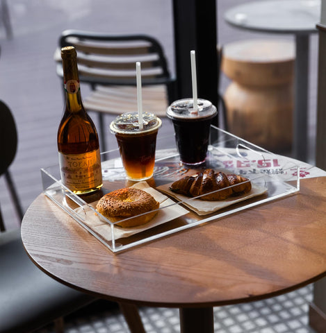 collwait trays holding appetizers highlighting presentation and serving capacity