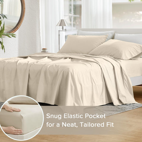 Comfort Spaces cream sheets styled on a made bed to show calming bedroom appeal