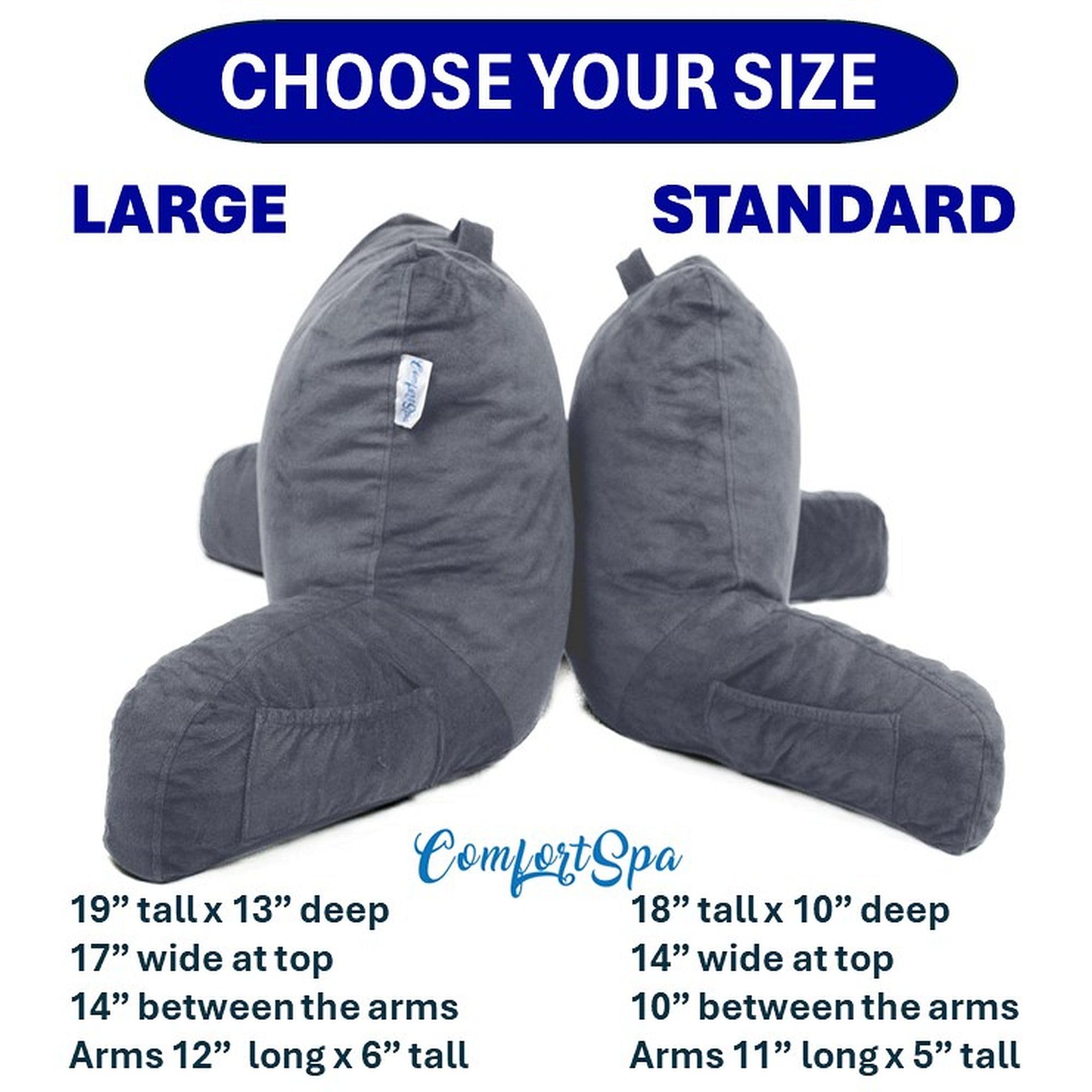 ComfortSpa pillow in bed while adult reads illustrating upright comfort