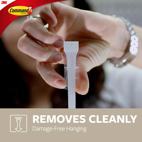 Command hooks holding curtain rod with sheer curtains showing easy styling benefit