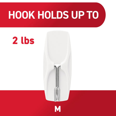 Command medium hook in a dorm room setting offering space-saving organization
