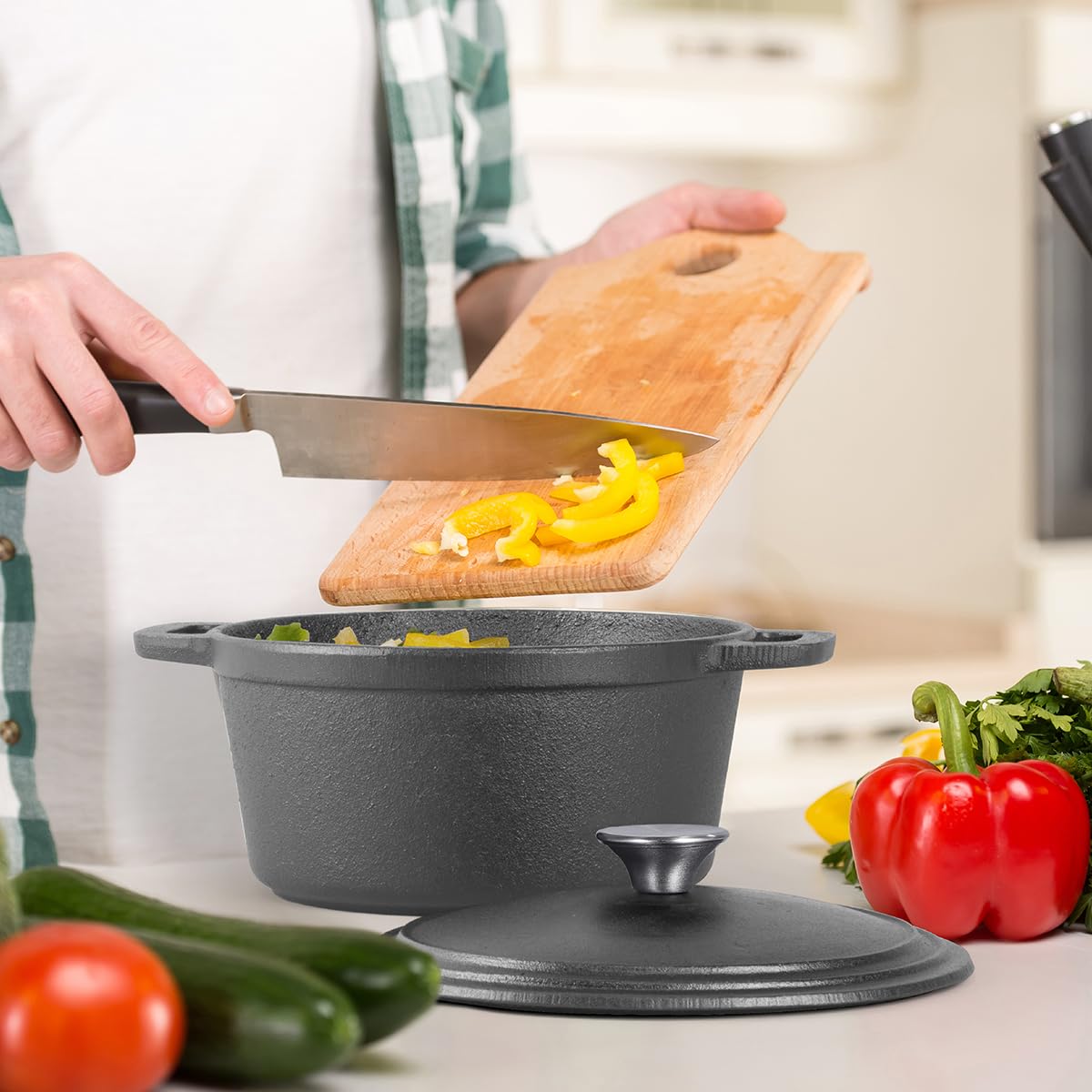 Commercial Chef Dutch oven cooking on stovetop delivering even heat distribution