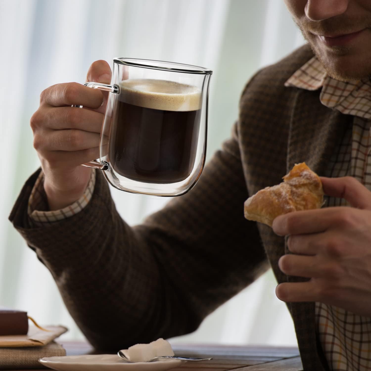 COMOME spoon placed with mug illustrating included stirrer convenience