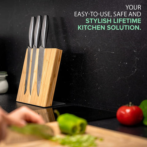 Coninx holding a frying pan to show strong magnetic support benefit