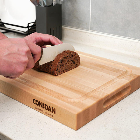 CONSDAN board with cloth and oil illustrating easy cleaning and upkeep