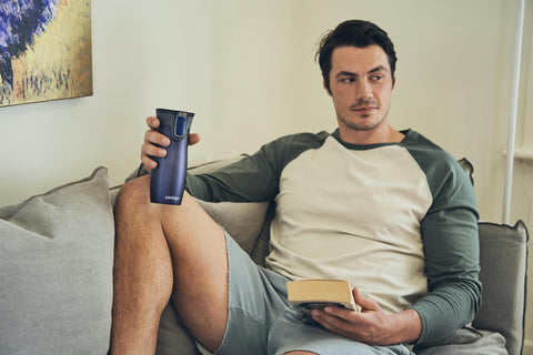 Contigo West Loop in hand during commute showing one-handed drinking convenience